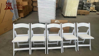 Chaise de salle à manger pliable en résine plastique, capacité de charge élevée, empilable et portable pour la location d'hôtels et de salles de réception