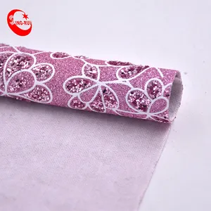 闪亮闪亮的精致针织花卉刺绣亮片织物闪光人造革床单，用于箱包装饰