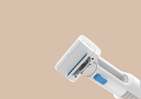 Appareil portable de toilettage et d'aspiration pour animaux de compagnie avec accessoires multiples