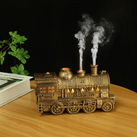 Diffuseur ultrasonique d'huile essentielle de minuterie d'eau de bureau à la maison de forme de train avec la LED