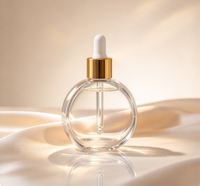 Flacon compte-gouttes rond en verre transparent vide de 20 ml pour sérum, huile capillaire ou huile essentielle, avec logo personnalisé, sérigraphié et estampé or