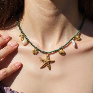 Collar de cuentas con colgante de estrella de mar y concha, cadena de clavícula de aleación de zinc chapada en oro de 18 quilates para mujer, joyería de moda. - Product Image 1