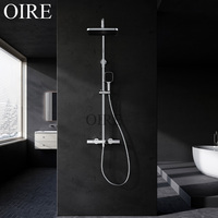 Ensemble de robinetterie de salle de bain Oire de luxe moderne en laiton et céramique, avec douche murale effet pluie pour villa
