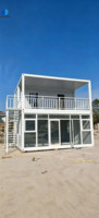 Conteneur plat de 20 pieds, maison préfabriquée modulaire à deux étages, bureau, hôtel, villa moderne avec grandes fenêtres en verre