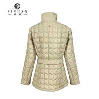 Classique léger matelassé femmes manteau mince Nylon tissus plié duvet de canard manteau avec ceinture en cuir matelassé doudounes dames