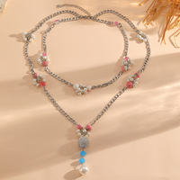 Collier tendance en cuivre style vintage avec fausses perles et bambou tressé, design de niche, chaîne élégante longueur ras-du-cou