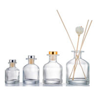 Vente en gros échantillon gratuit Flacon rond en verre vide de 50ml 100ml 150ml 200ml pour diffuseur de parfum avec bouchon en liège