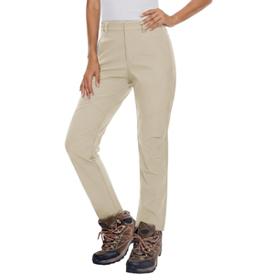 Pantalon de ski imperméable beige pour femme avec poches zippées et technologie Gore-Tex pour les activités de neige en plein air - Product Image 1