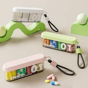 Boîte à pilules portable, organiseur de médicaments hebdomadaire miniature pour 7 jours, avec compartiments pour les voyages, utilisation quotidienne, boîte de rangement pour médicaments en plastique - Product Image 1