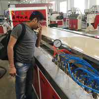 Mesin Pembuat Papan Pintu PVC WPC Harga Pabrik DINGKUN, Mesin Ekstrusi Panel Pintu PVC, Lini Profil Kusen Pintu