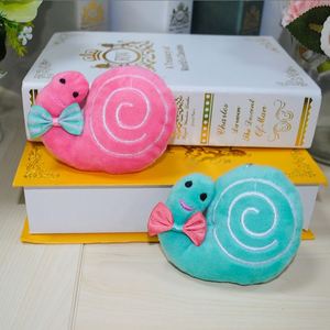 Mini arco suave Caracol peluche animales juguetes llavero Peluches Plushie muñeca bolsa encanto colgante garra máquina llavero - Product Image 1