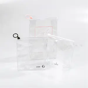 OEMプライベートラベルカスタムプリント防水PVCクリア透明リングジッパーピンクスタンドアップジッパーポーチ