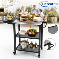 Chariot de préparation pour barbecue avec plateau en acier inoxydable argenté, étagères latérales en maille extensible et roues verrouillables
