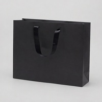 Sac de shopping en papier noir pliable avec poignées pour emballages de détail personnalisés, vêtements, cosmétiques, cadeaux et produits de marque