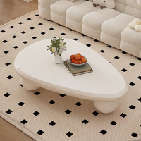 Table basse nuage crème style moderne et épuré pour salon