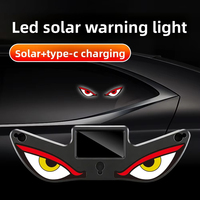 Nouvelle lampe LED sans fil solaire pour voiture, motif œil de démon triangulaire, à fixer sur la vitre, avec expression de petit monstre, lumière d'ambiance, sans câblage