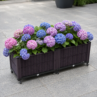 Jardinière rectangulaire en plastique imitation rotin PP, lit de jardin surélevé en osier tressé marron, léger, avec roulettes, trous de drainage et système d'arrosage automatique