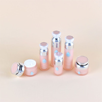 Ensemble de flacons cosmétiques ronds en acrylique rose de luxe personnalisés de 30 g, 50 g, 15 ml, 30 ml, 50 ml, 100 ml, emballage par KINPACK