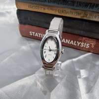 Nouvelle Montre Femme Vintage à Quartz en Acier Inoxydable, Design Simple et Compact, Étanche, Chiffres Romains, Tendance, Vente en Gros, Garantie 1 An
