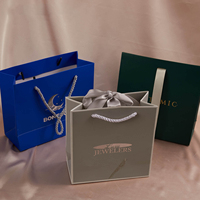 Sacs en papier de luxe personnalisés pour bijoux, petits sacs en papier avec nœud papillon et boîte pour l'emballage de vêtements et de bijoux