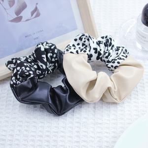 Chouchous en <span class=keywords><strong>cuir</strong></span> de couleur assortie pour les cheveux Léopard noir et <span class=keywords><strong>blanc</strong></span> avec bandes de cheveux cassées - Product Image 1