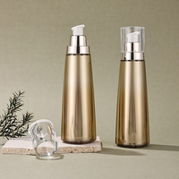 Flacon conique acrylique de 130ml bouteille de lotion en plastique dorée pompe à pression emballage cosmétique bouteille de sérum de soins de la peau en spray