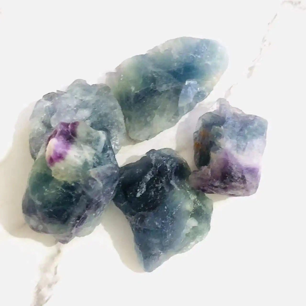 wholesale high quality low fluorite price natural rainbow fluorite rough healing raw crystal stones for fengshui