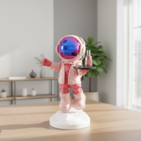 Statue d'astronaute Art déco moderne en résine, artisanat durable, décoration de maison, sculpture de bureau, cadeaux de remise de diplôme, porte-stylos