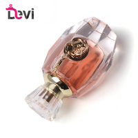 Flacon de parfum ovale en verre de 50 ml avec pompe pulvérisatrice, estampage à chaud, emballage carton, vide, rechargeable, orange rose, OEM/ODM, vente en gros Devi