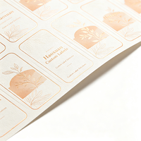 Étiquettes personnalisées Haoxuan pour flacons d'huile de beauté, autocollants en papier d'art gaufré à l'or pour emballages cosmétiques haut de gamme