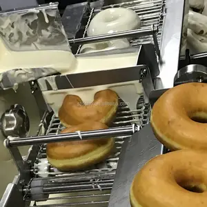 "Unique Choice in Baking: Small Donut Machine with Fryer and Flip Capabilities"