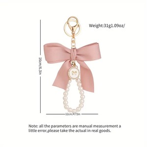 Élégant Mignon Arc Sac Charme Faux Perle Perlé Bracelet Téléphone Longe Sangle De Voiture Marque Porte-clés Cadeaux Fête Des Mères