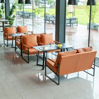 Ensemble de canapé et fauteuil en cuir avec table basse à structure métallique pour café, restaurant, bar, hall d'hôtel, espace détente