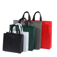 Sacs fourre-tout non tissés stratifiés pressés à chaud Sacs cadeaux publicitaires Sacs en plastique en gros Magasin de vêtements