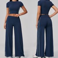 Nouvel ensemble de fitness amincissant couleur unie, respirant, à compression, séchage rapide, extensible dans les quatre sens, composé d'un crop top à manches courtes et d'un pantalon à taille repliable