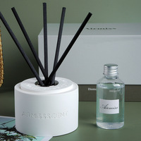 Vente en gros de roseau aromatique béton plâtre peinture chinoise diffuseur rond logo personnalisé boîte cadeau unique bouteille diffuseurs de roseaux
