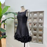 Vente en gros de vêtements de boutique pour l'été, nouvelle robe élégante à col rond sans manches avec nœud papillon en patchwork