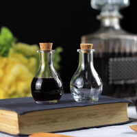 En stock Mini pots en verre transparent de 50 ml avec couvercle en liège Contenant en verre unique pour bonbons Stockage de safran 5g Bouteilles à vœux Bouchon en plastique