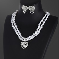 Collier et boucles d'oreilles en or brillant avec perles baroques hypoallergéniques et filigrane creux en forme de cœur, vente en gros d'usine