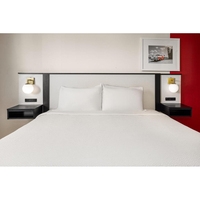 Vente en gros de meubles d'hôtel Ramada Inn Vente directe d'usine Meubles de chambre à coucher en bois massif pour hôtel à guichet unique
