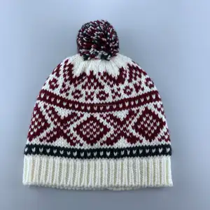 ODM custom designed high quality winter pattern knitted hat acrylic with fur pom pom beanie hats unisex