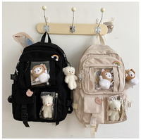 2022 à la mode dessin animé poupée designer logo personnalisé adolescent cartable livre sacs décontracté sacs d'école femmes sac à dos pour collège fille