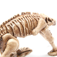 Décor de l'aquarium : Nouvelle maison cachée en résine écologique personnalisée en forme de crâne de dinosaure/lézard pour reptiles rampants