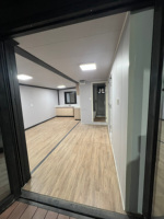 Maison conteneur modulaire extensible de luxe en acier avec conception étanche pour une vie moderne, idéale pour chambre, villa, bureau et appartement
