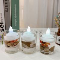 Produit chaud pour le dropshipping Bougies flottantes les plus vendues: Lumière sur l'eau. Accessoires pour bougies électroniques étanches à LED