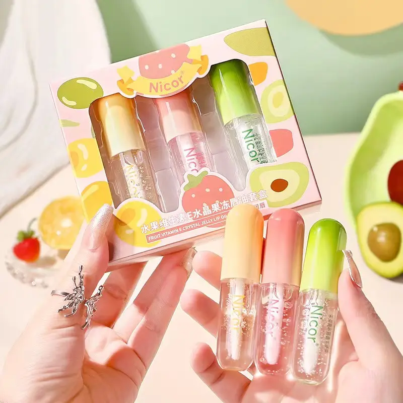 Vente en gros de 4 tubes d'huile pour les lèvres Fruit Honey Huile pour les lèvres vegan hydratante et hydratante Ensemble de maquillage de marque privée pour fille