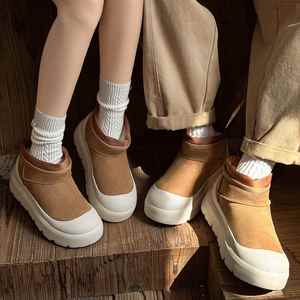 Bottes d'hiver courtes doublées de polaire pour couple |   Chaussures en velours de fibres de vache pour hommes |   Bottes de neige de haute qualité - Product Image 4