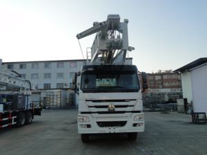 Hoogrenderende Op Vrachtwagens Gemonteerde <span class=keywords><strong>Workover</strong></span> <span class=keywords><strong>Rig</strong></span> Met Api-Gecertificeerd Hydraulisch Systeem Voor Olievelden Op Land - Product Image 4