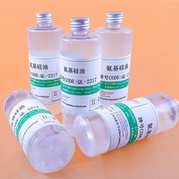 Huile de silicone modifiée aux acides aminés QL-2217, produit auxiliaire de finition pour adoucir les tissus textiles