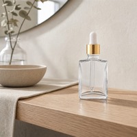 Flacon de sérum en verre carré plat avec compte-gouttes, flacon cosmétique vide transparent pour les soins de la peau, vente en gros